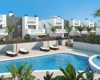 blue pool surrounded by new apartments for sale benijofar