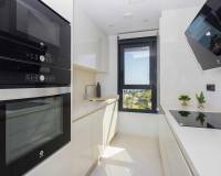 fully equipped kitchen in this new penthouse for sale mil palmeras