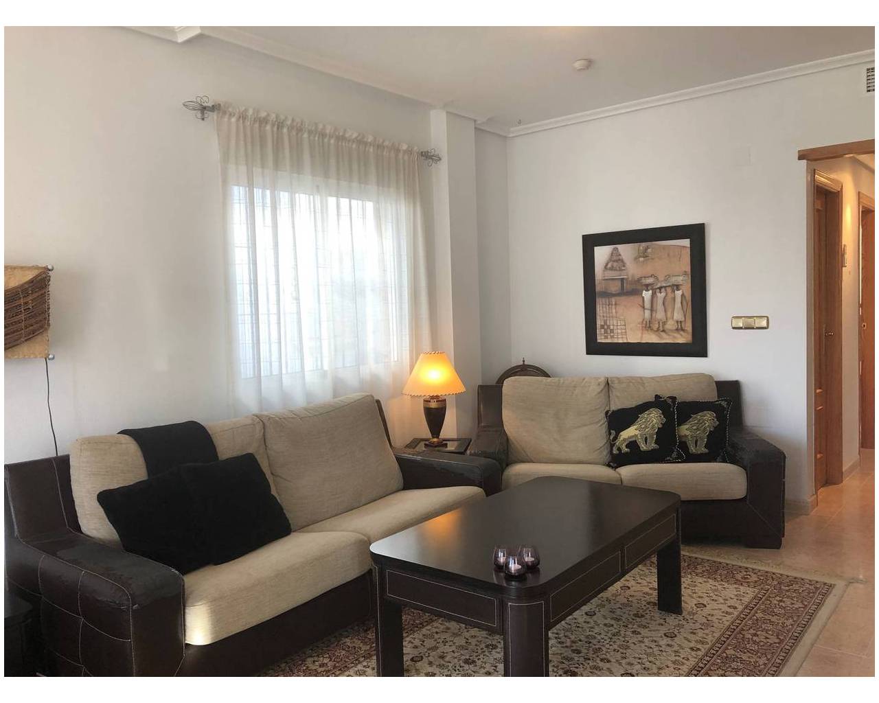 chaise lounge in bright living room of this el raso property for sale from zebra homes real etstate guardamar